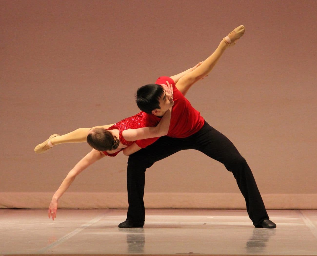 a man and woman dancing