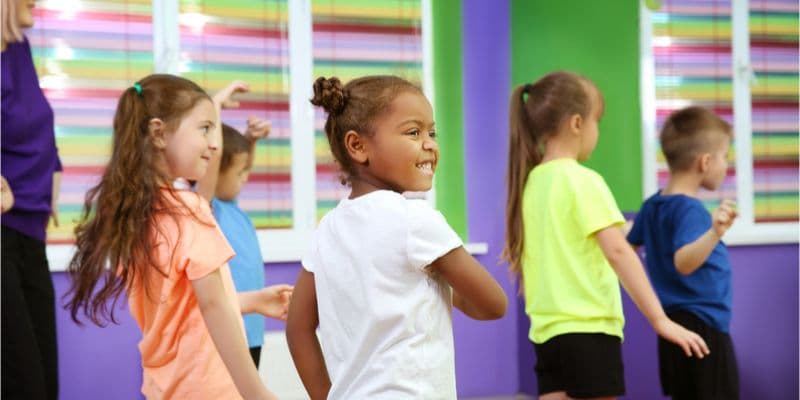 a group of children in a classroom