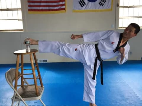 a man in a karate uniform