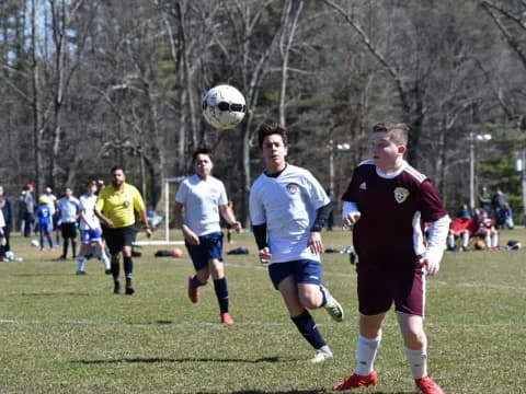 a group of men playing football
