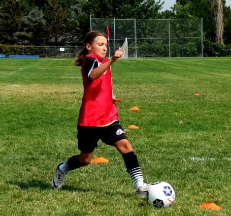 a girl playing football