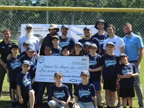 a group of people holding a sign