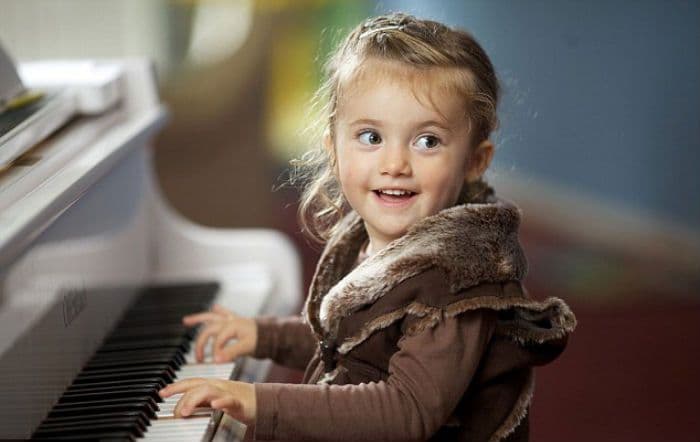 a child playing a piano