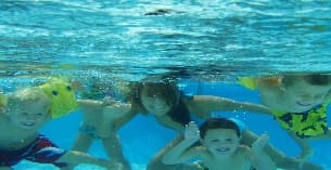 a group of people in the water