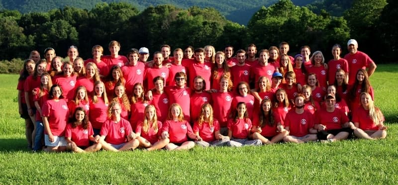 a group of people posing for a photo
