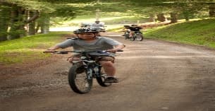 a man riding a motorcycle