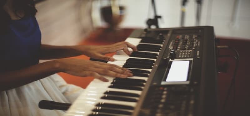 a person playing a piano