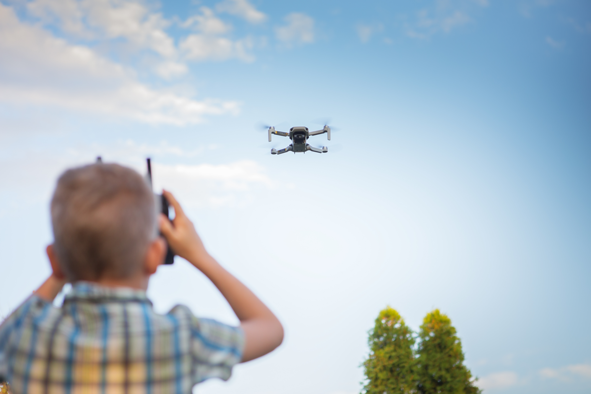 a child watching a helicopter