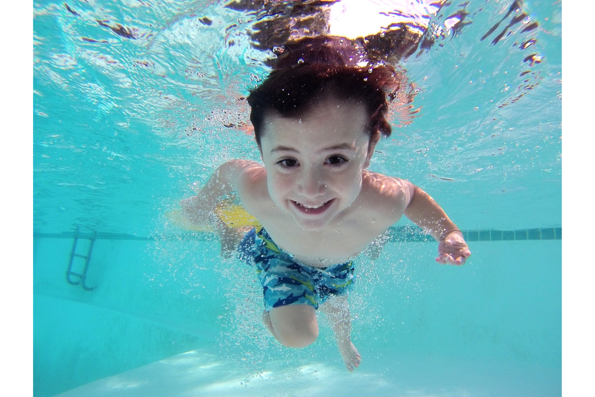 a boy in a pool