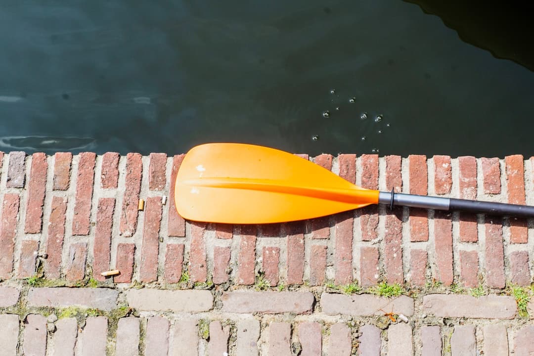 orange boat paddle