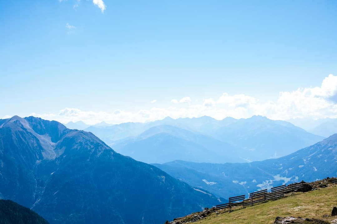 a mountain range with clouds