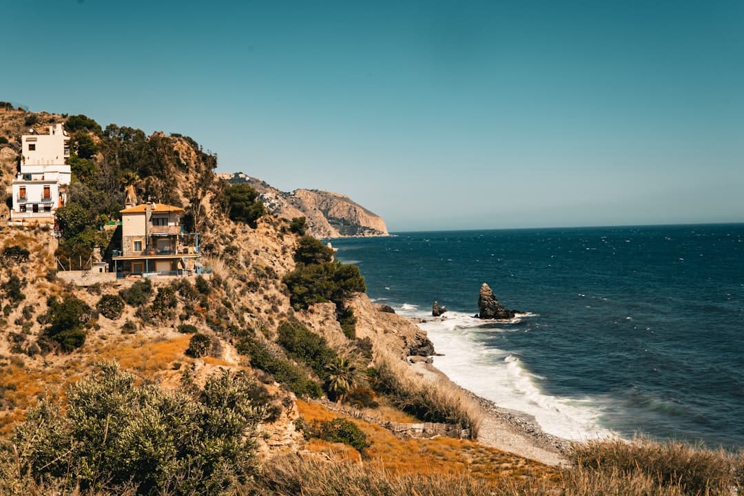 a house on a cliff overlooking the ocean