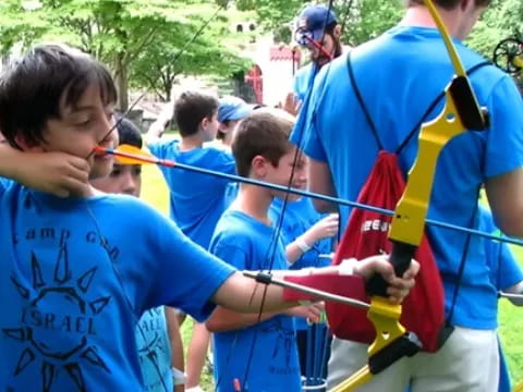 a group of people holding a toy