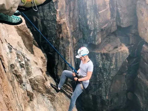 a man rock climbing