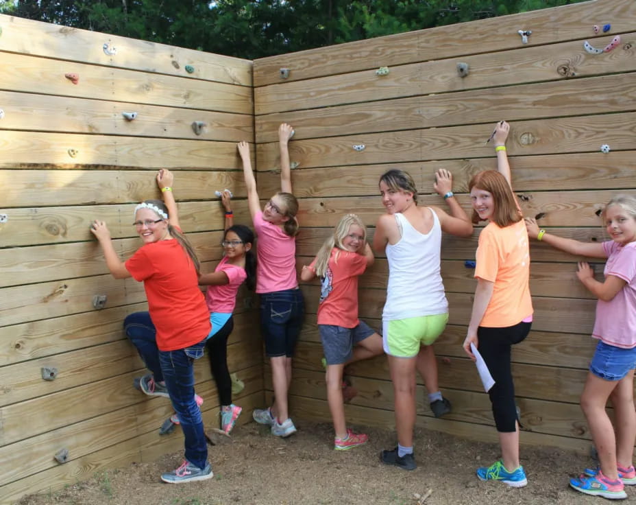 a group of girls posing for a photo