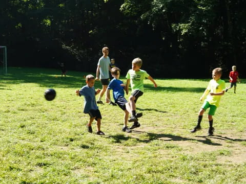 a group of kids playing football