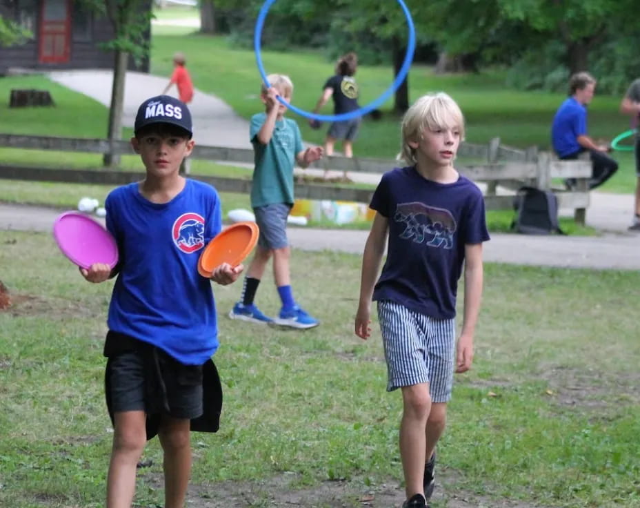 kids playing with frisbees
