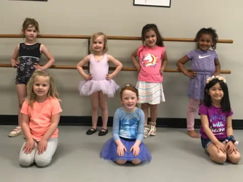 a group of children posing for a photo