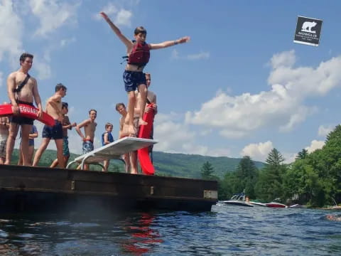a group of people on a dock