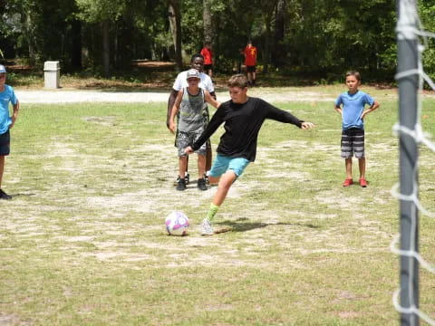 a group of people play football