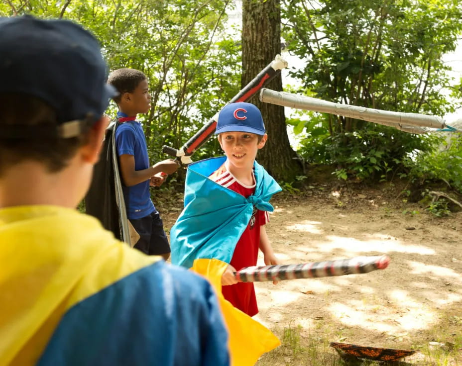a group of people holding a sword