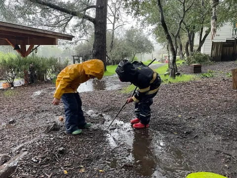 two people in rain gear