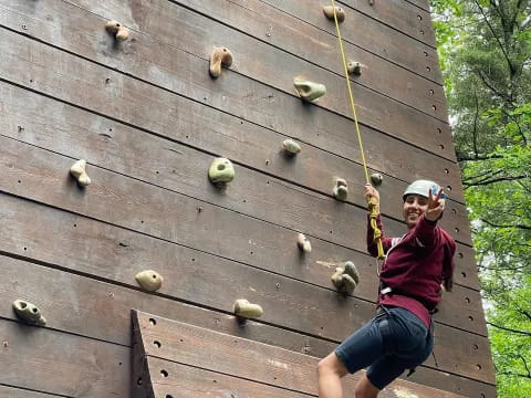 a person sitting on a wooden deck