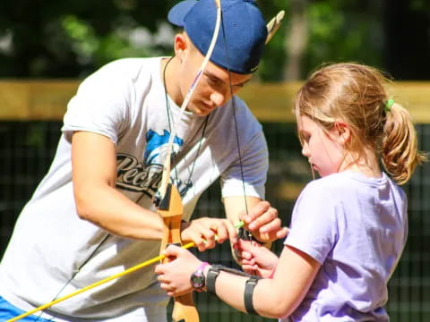 a man and a woman playing tennis