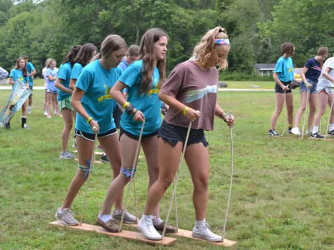 a group of girls holding hands