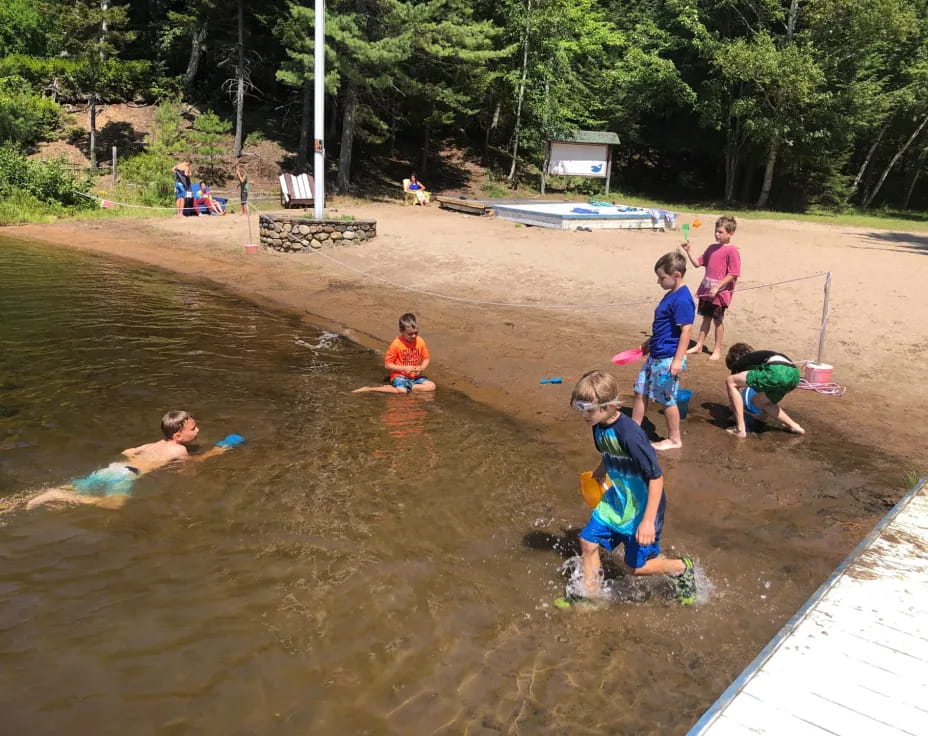 a group of people in a river