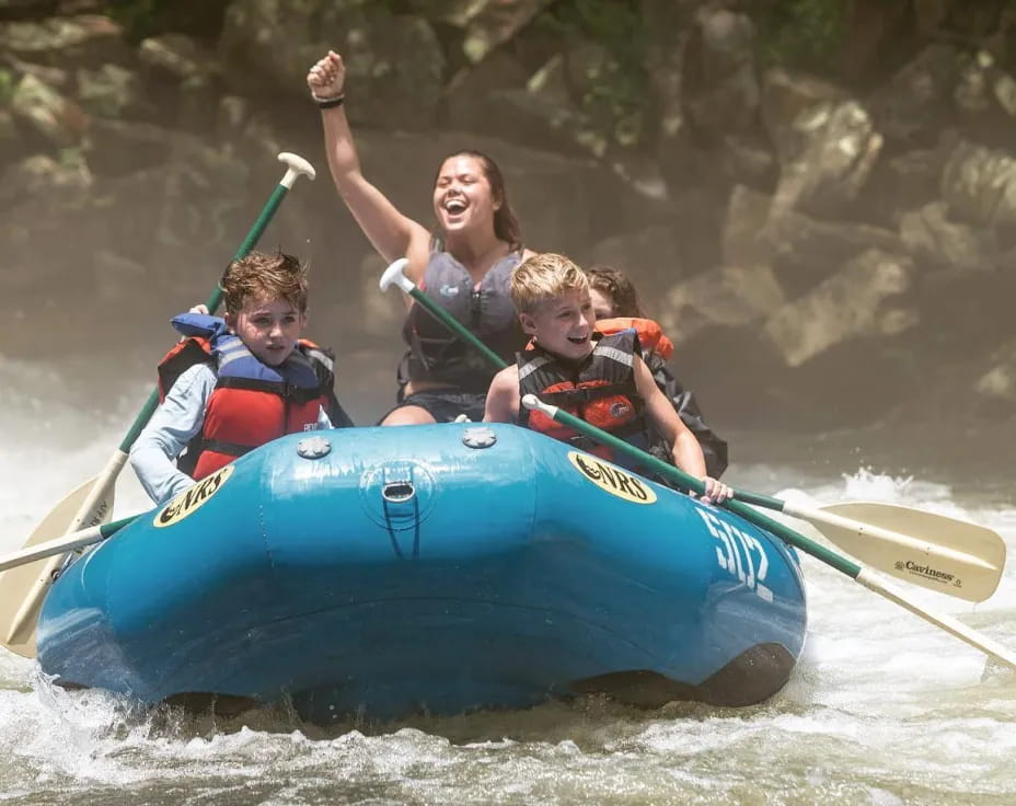 a group of people in a raft
