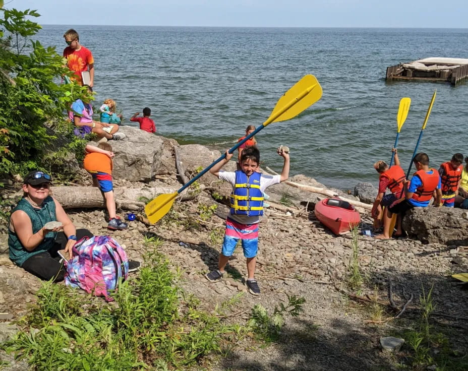 a group of people on a beach