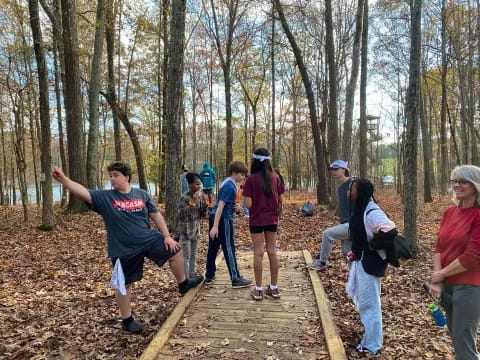 a group of people in the woods