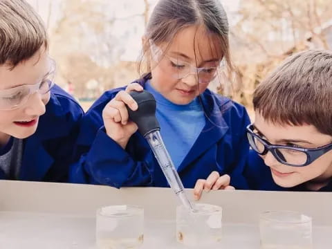 a few children looking at a test