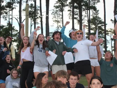 a group of people in a forest