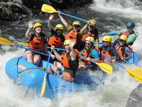 a group of people in a raft