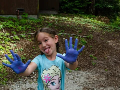 a girl with her hands up