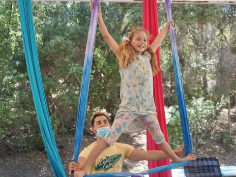 a group of people on a swing