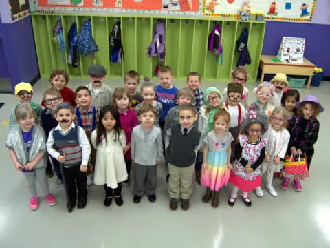 a group of children posing for a photo