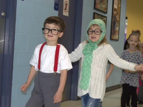 a group of children wearing clothing