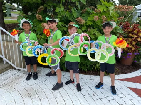 a group of people holding flowers