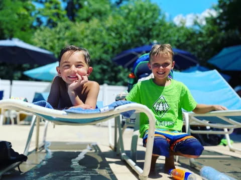two boys sitting at a table