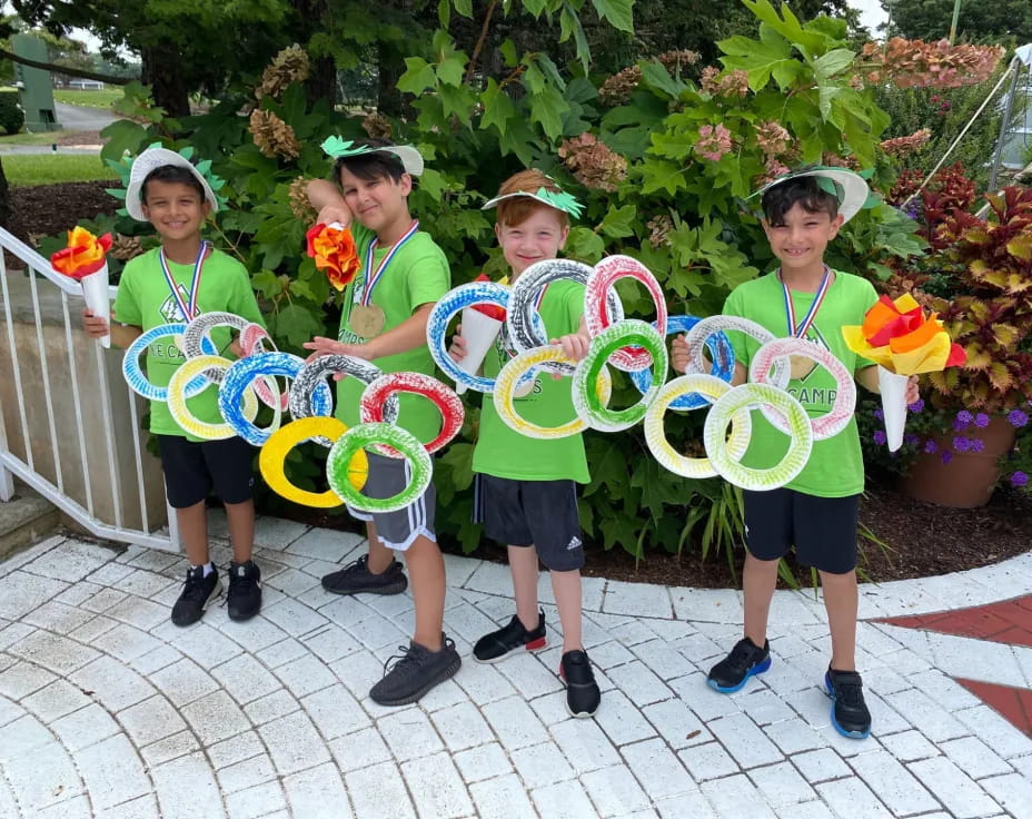 a group of people holding flowers