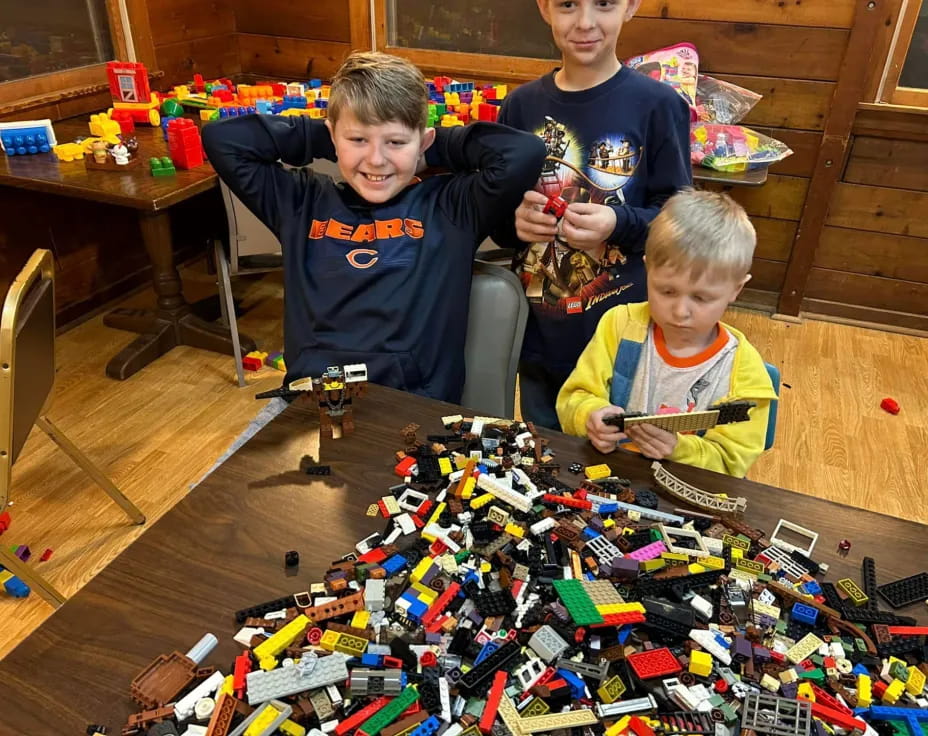 a group of boys playing with toys