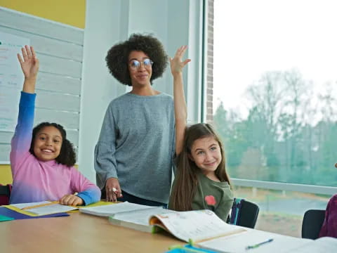 a teacher teaching her students