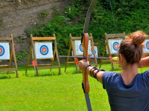 a person shooting bows