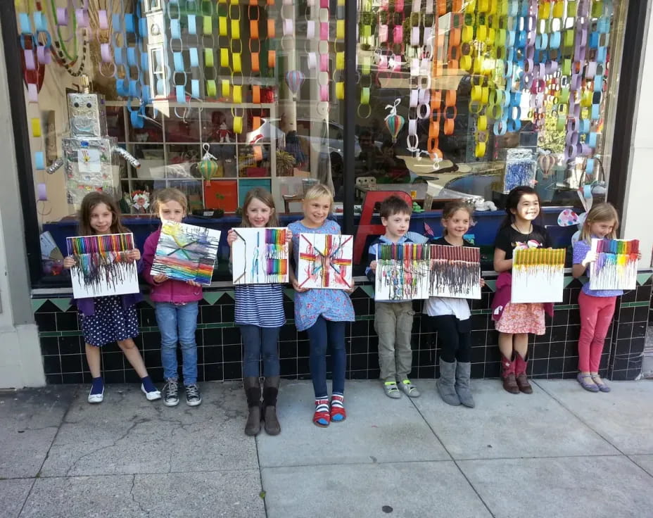 a group of children holding signs