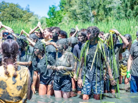 a group of people in raincoats
