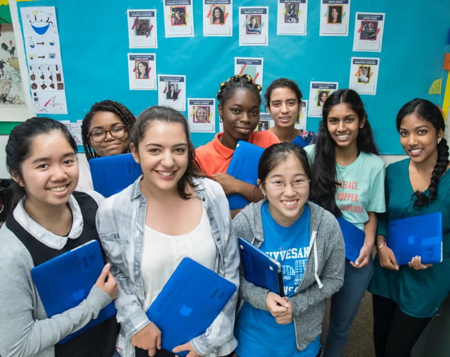 a group of girls posing for a photo