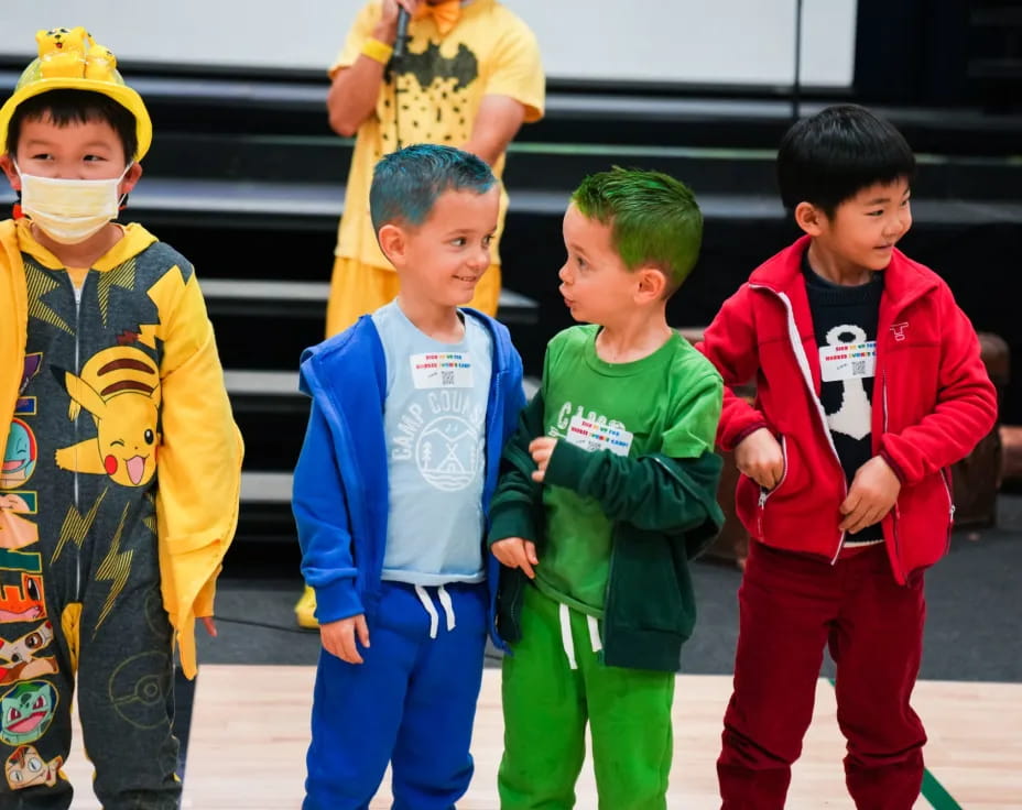 a group of boys in clothing